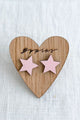 Small star button earrings, soft pink